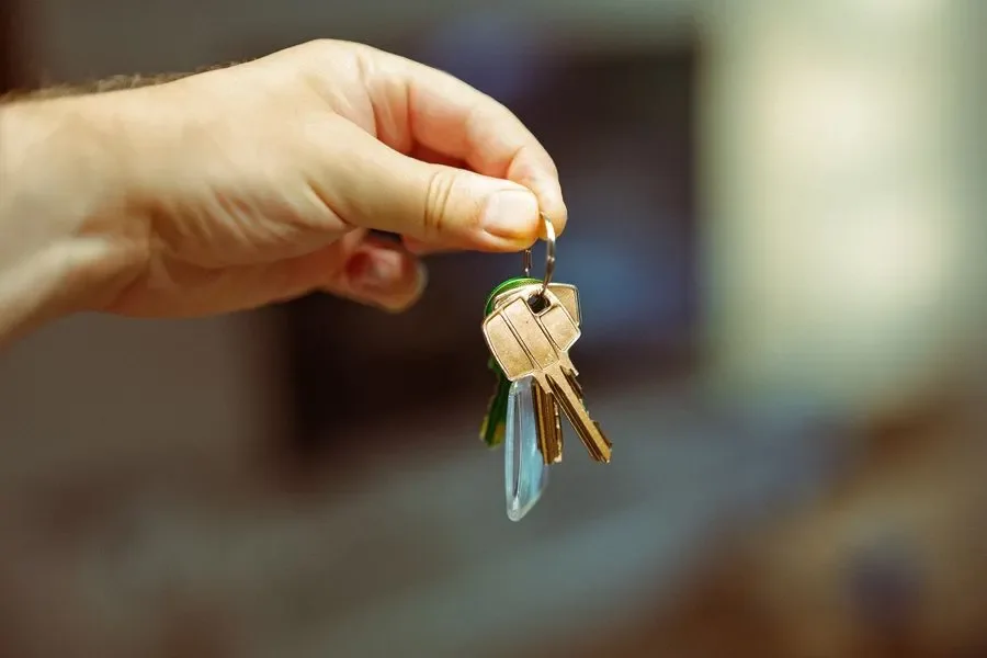 Hand holding a set of house keys – residential locksmith Chester help for landlords and letting agents from Locksmith Chester